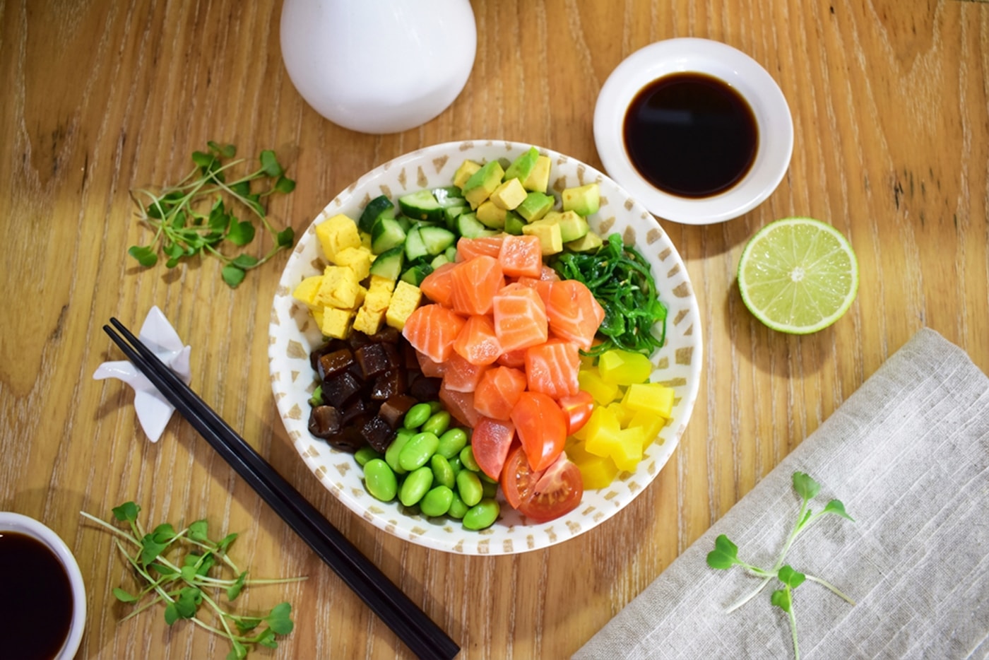 Salmon and avocado grain bowl with vegetables for a high-protein meal